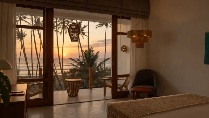 Sonnenuntergang über dem Ozean, gesehen von der Terrasse des Ocean View Room